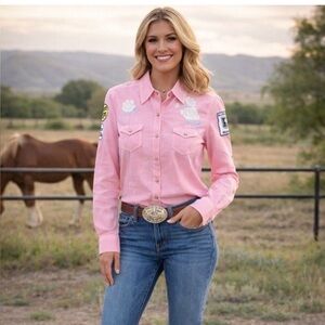 Ariat EUC pink floral pin stripe pearl snap closure blouse. Patched sleeves sz S